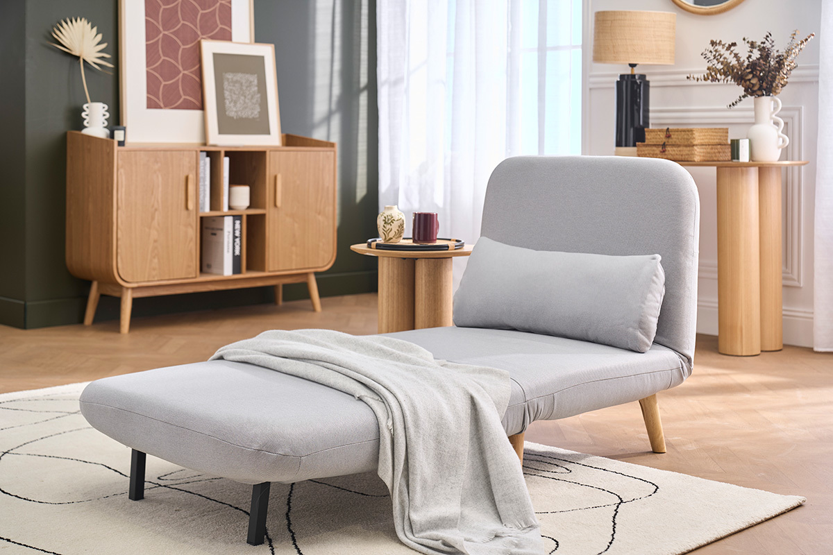Fauteuil convertible scandinave en tissu gris clair et bois clair AMIKO
