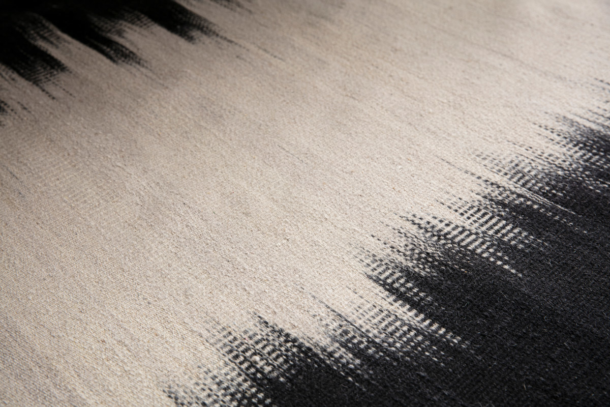 Tapis en laine ivoire et noir 160 x 230 cm IKAT